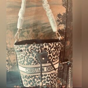 Dior Leopard Print Shoulder Bag with Black Accents
Bucket crossbody GWP bag .
